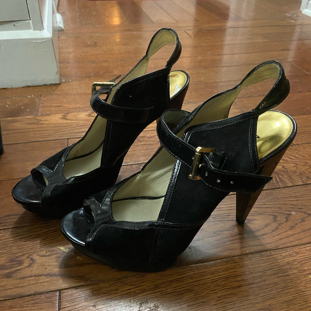 Ladies buckle up Michael Kors heels